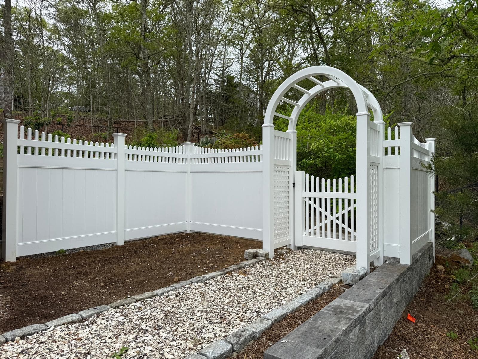 Close-up of aluminum fence rail and picket connection showing precision metalwork by JT Fence Inc.